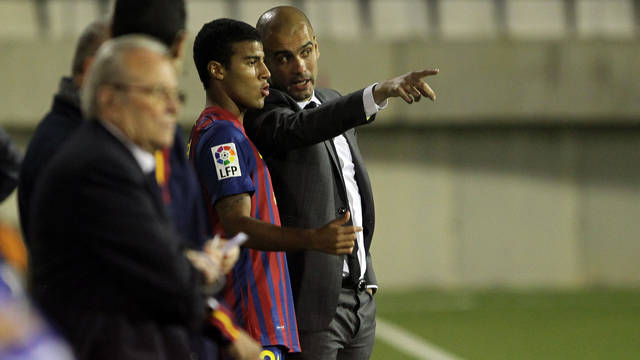 Rafinha with Guardiola. PHOTO: MIGUEL RUIZ (FCB).