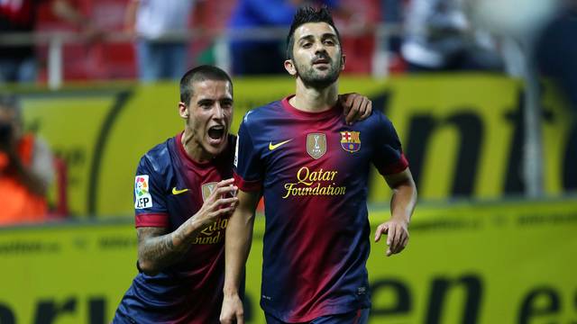 Tello and Villa celebrate the match-winning goal / PHOTO: MIGUEL RUIZ-FCB