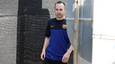 Iniesta on his way to the press room / PHOTO: MIGUEL RUIZ-FCB