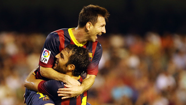 Messi, celebrating a goal with Fàbregas. PHOTO: MIGUEL RUIZ - FCB