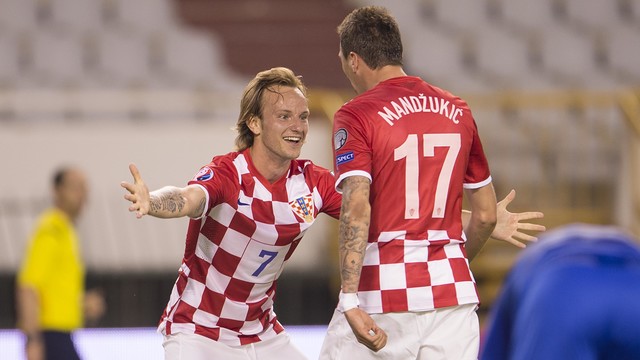 Ivan Rakitic celebrates a goal for Croatia with countryman Mario Mandzukic. / DRAGO SOPTA - HNS